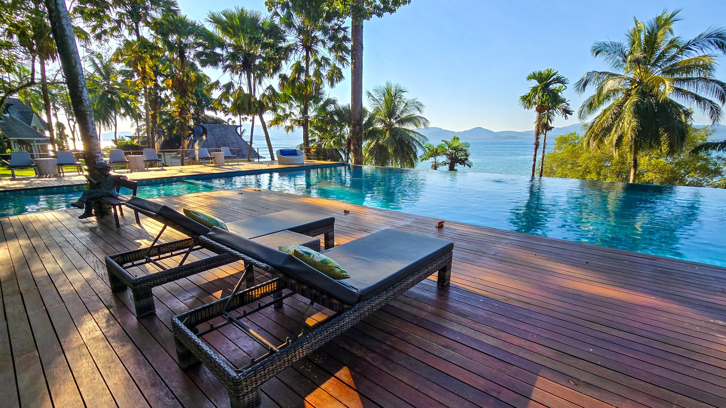 Infinity pool spa terrace with mountain water view